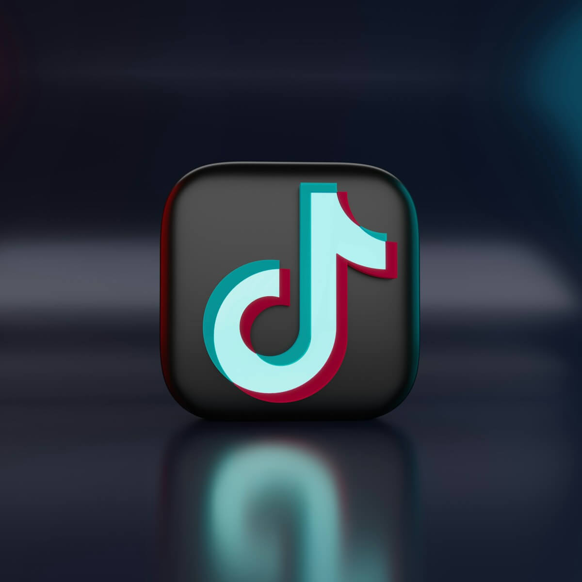 Vibrant TikTok logo on a dark gradient background, highlighting its iconic musical note design.